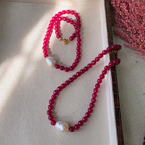Ruby beaded necklace with baroque pearl