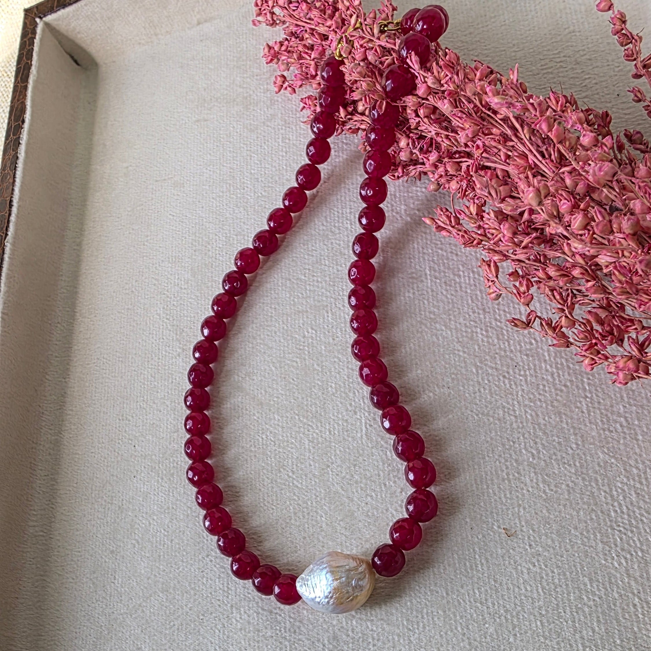 Ruby beaded necklace with baroque pearl