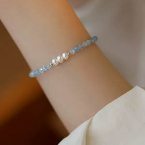 "Handmade Aquamarine and Freshwater Pearl bracelet with gold-plated details by Urban Gear"