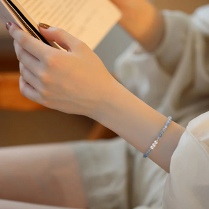 "Handmade Aquamarine and Freshwater Pearl bracelet with gold-plated details by Urban Gear"