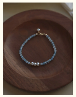 "Handmade Aquamarine and Freshwater Pearl bracelet with gold-plated details by Urban Gear"