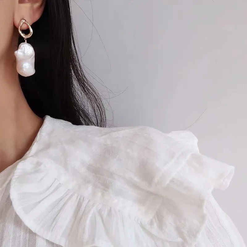 Luxury baroque freshwater pearl drop earrings with sculpted gold-plated studs – modern handcrafted jewelry