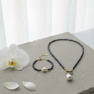 Black Freshwater Pearl Necklace with White Baroque Pendant & Gold-Plated Accents