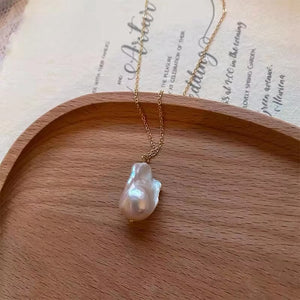 baroque pearl necklace and matching gold-plated earrings with freshwater pearls