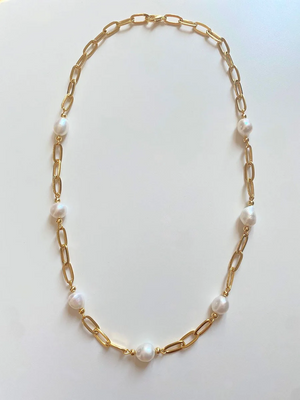 Elegant baroque freshwater pearl necklace with an 18K gold-plated chain.