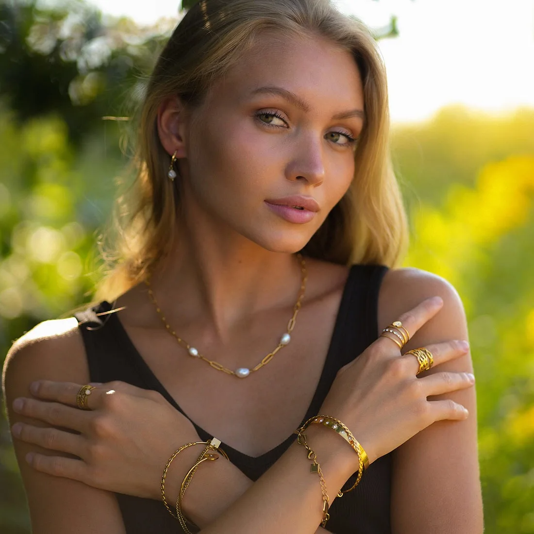 Elegant baroque freshwater pearl necklace with an 18K gold-plated chain.