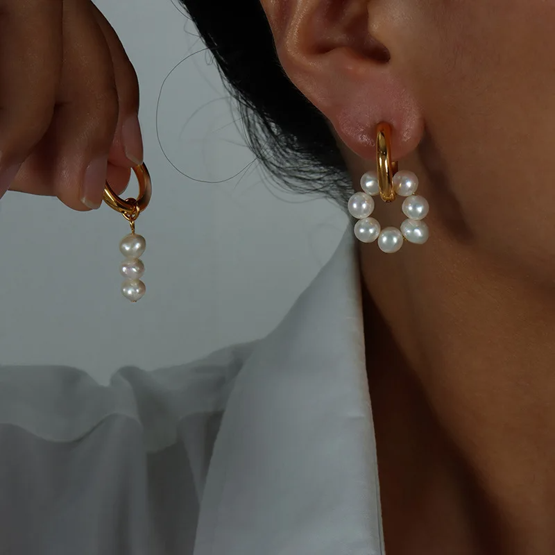 Model wearing 18K Gold-Plated Asymmetric Hoop Earrings with Freshwater Pearl Danglers by Urban Gear