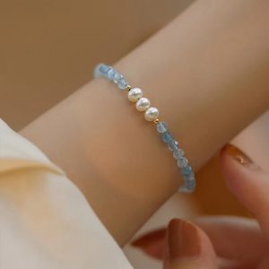 "Handmade Aquamarine and Freshwater Pearl bracelet with gold-plated details by Urban Gear"

