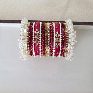 Handcrafted maroon Kundan and pearl bangles set – festive traditional jewelry by Urban Gear