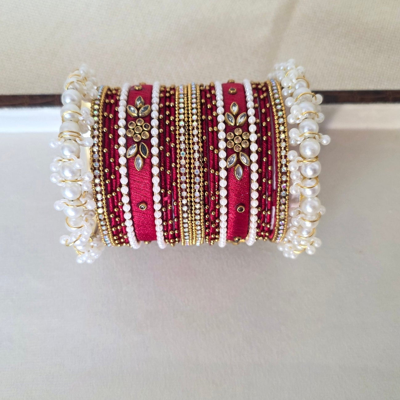 Handcrafted maroon Kundan and pearl bangles set – festive traditional jewelry by Urban Gear
