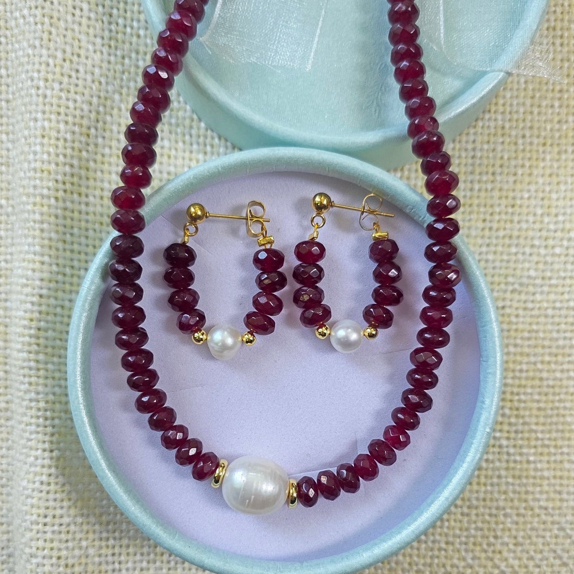 by beaded necklace set with natural freshwater pearl and matching earrings