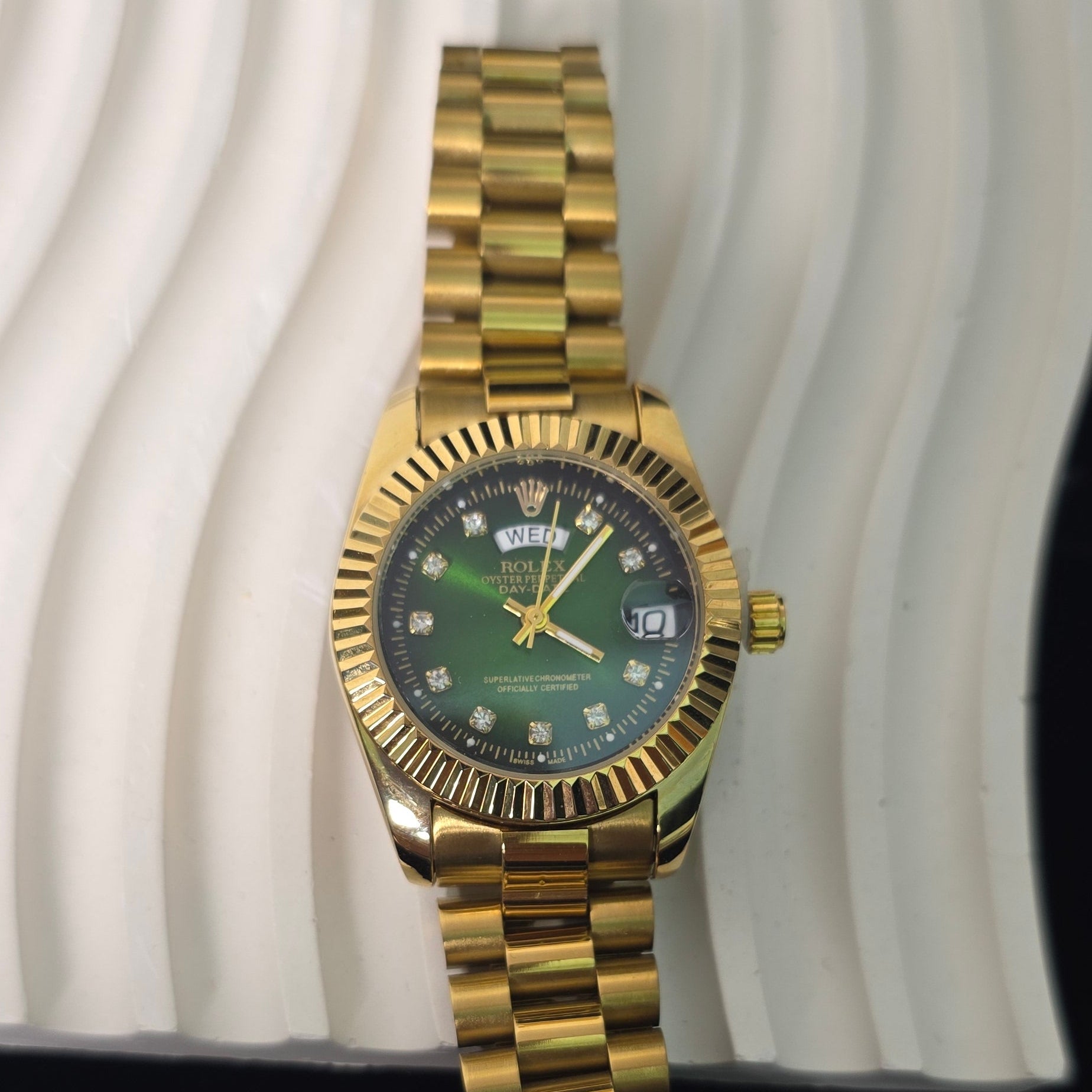 green dial gold watch women