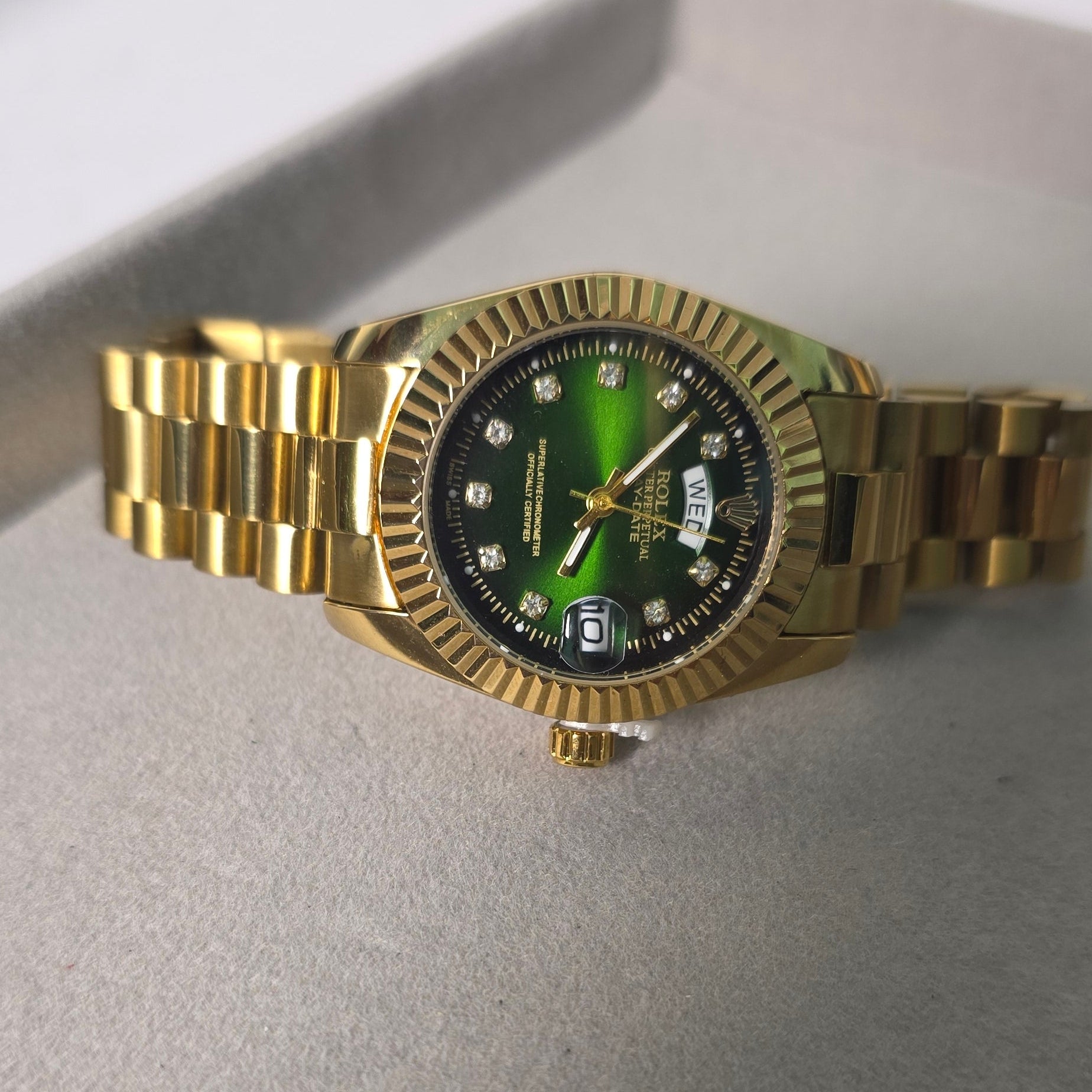 green dial gold watch women