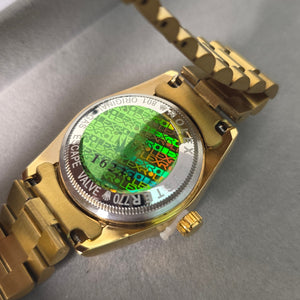 green dial gold watch women