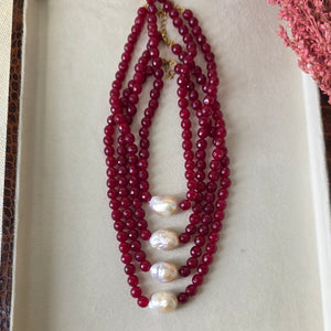 Ruby beaded necklace with baroque pearl