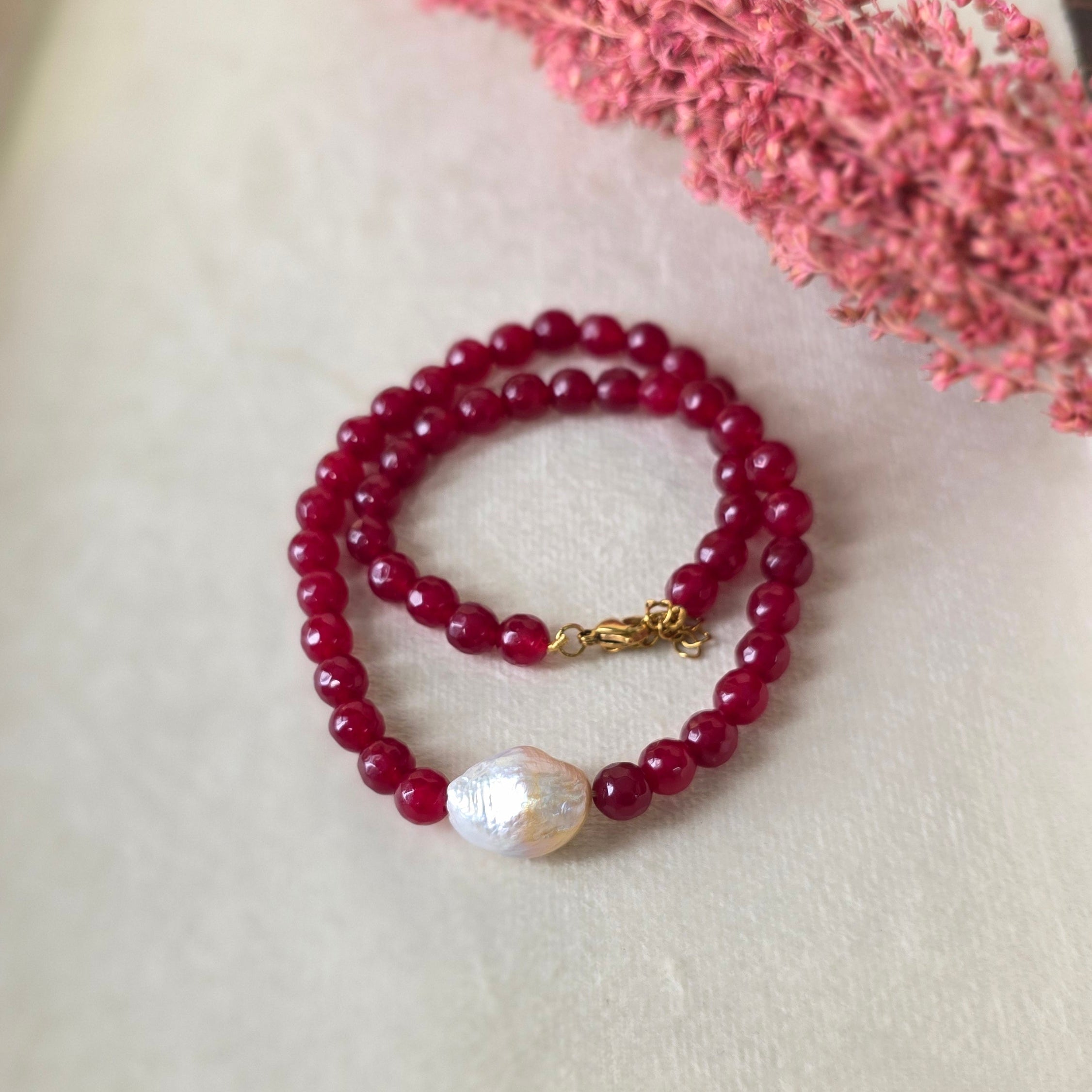 Ruby beaded necklace with baroque pearl