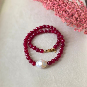 Ruby beaded necklace with baroque pearl