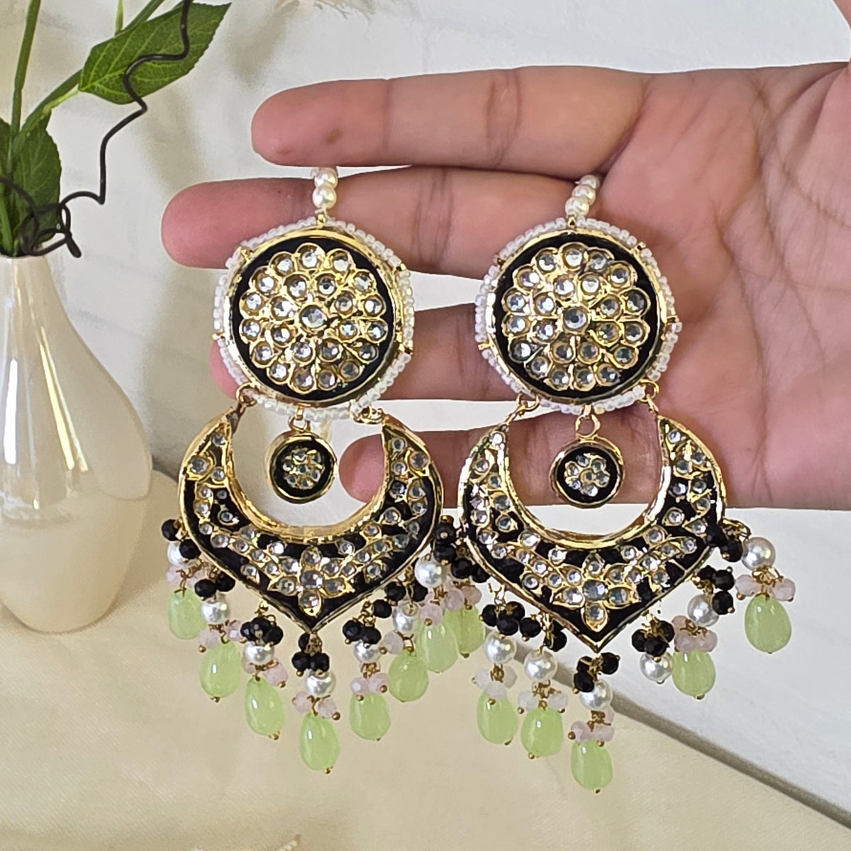 Gold plated Thappa Kundan Meena work statement earrings with colorful hanging accents