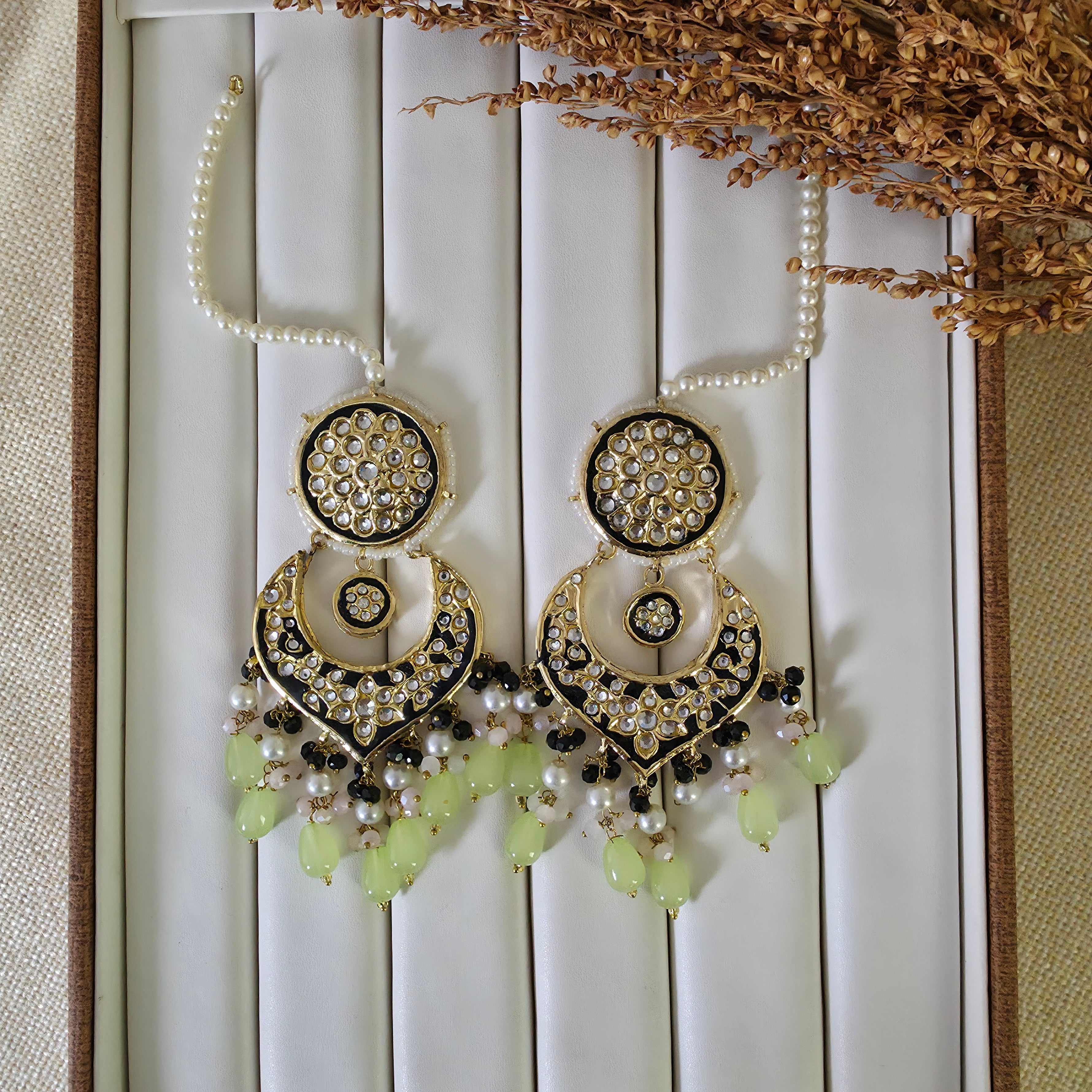 Gold plated Thappa Kundan Meena work statement earrings with colorful hanging accents
