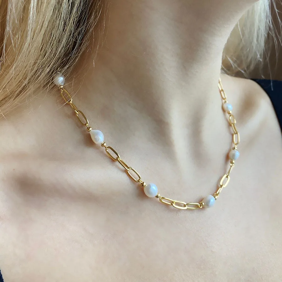 Elegant baroque freshwater pearl necklace with an 18K gold-plated chain.