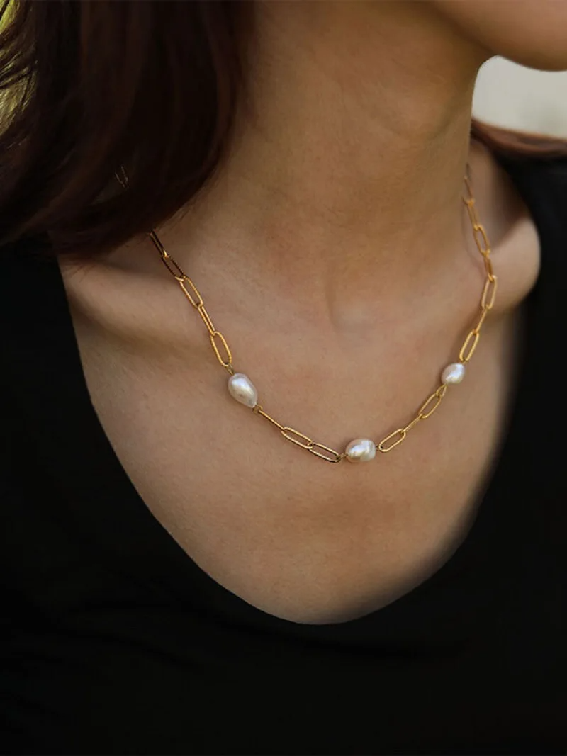 Elegant baroque freshwater pearl necklace with an 18K gold-plated chain.