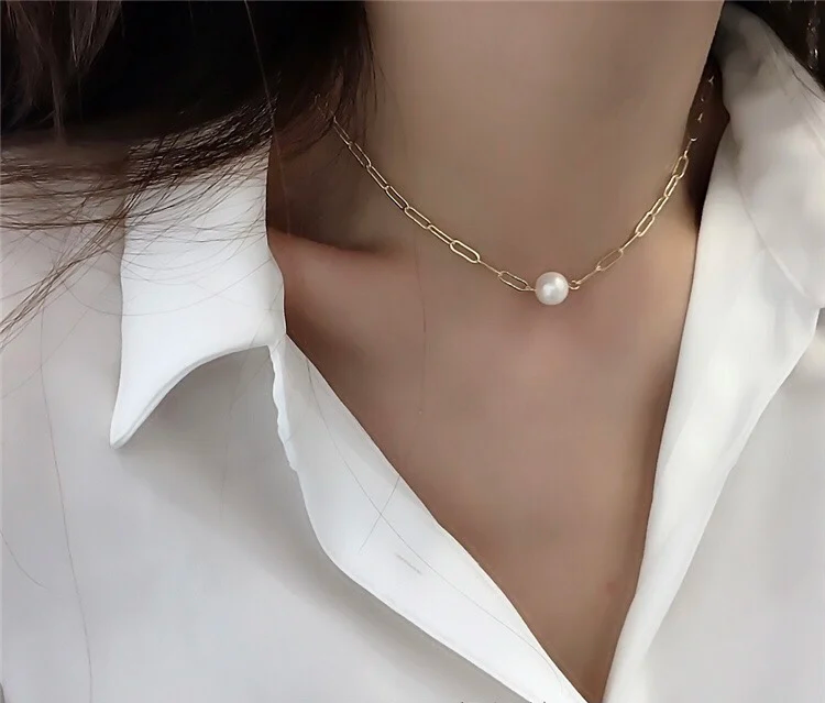 Elegant baroque freshwater pearl necklace with an 18K gold-plated chain.