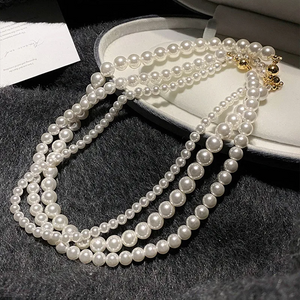 Magnetic White Pearl Necklace with European and American style, featuring elegant white pearls and a secure magnetic clasp, perfect for personalized fashion