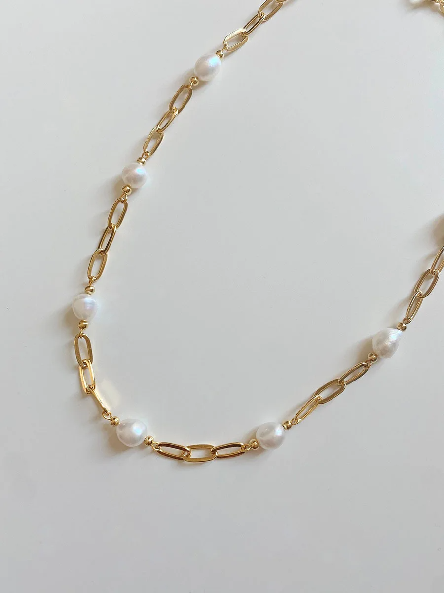 Elegant baroque freshwater pearl necklace with an 18K gold-plated chain.