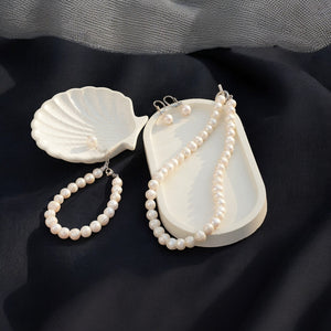 Freshwater pearl necklace set," "Elegant pearl bracelet," and "Luxury pearl earrings