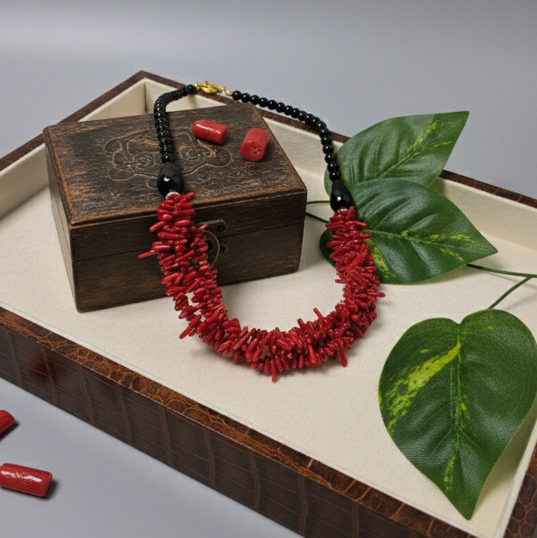 Red coral and black onyx handmade necklace close-up