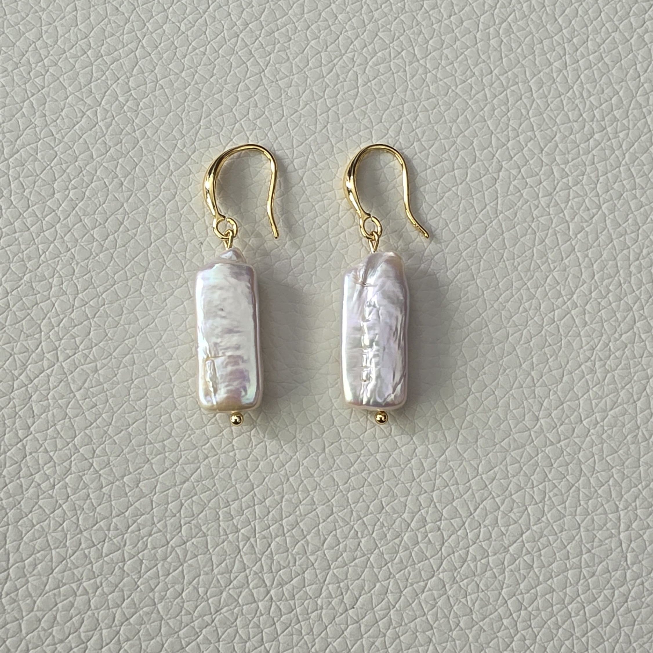 Rectangular freshwater pearl earrings with gold hooks on display card – Urban Gear