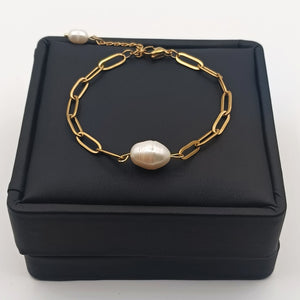 18K gold-plated chain bracelet with natural freshwater pearl centerpiece on black jewelry box – elegant adjustable design