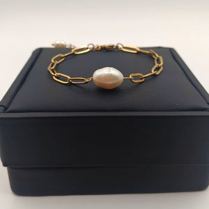 18K gold-plated chain bracelet with natural freshwater pearl centerpiece on black jewelry box – elegant adjustable design