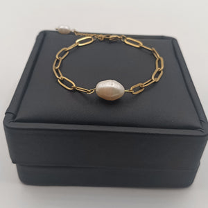 18K gold-plated chain bracelet with natural freshwater pearl centerpiece on black jewelry box – elegant adjustable design