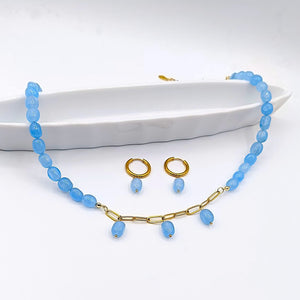 Handcrafted aquamarine stone necklace and gold hoop earrings set with adjustable gold chain