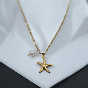 18K Gold-Plated Starfish Pendant Necklace with Freshwater Pearl on a white background