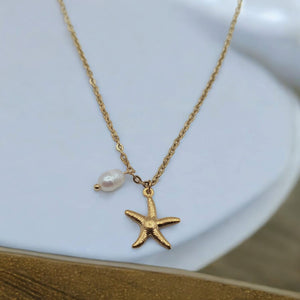 18K Gold-Plated Starfish Pendant Necklace with Freshwater Pearl on a white background