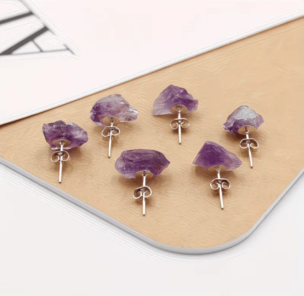 Natural amethyst raw stone stud earrings in purple with approximately 2 cm length