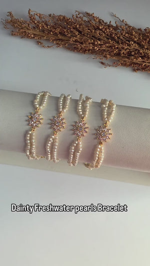 Genuine freshwater pearl bracelet with gold floral centerpiece