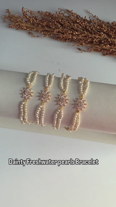 Genuine freshwater pearl bracelet with gold floral centerpiece