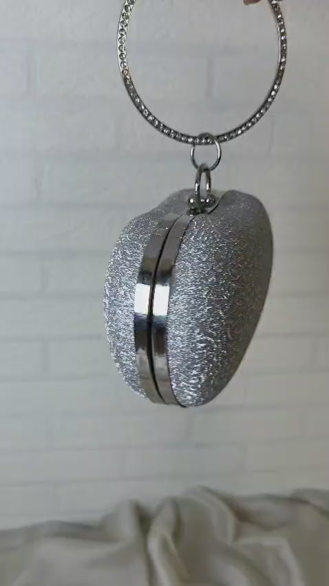 Silver Clutch, Crystal Clutch, Party Bag, Evening Clutch, Bridal Clutch, Festive Bag, Designer Clutch, Urban Gear Accessories, Formal Handbag, Luxury Bag, Glamorous Clutch, Metallic Silver Clutch, Shimmer Bag, Elegant Purse, Wedding Accessories, Urban Gear Collection, Women’s Party Accessories, Stylish Clutch Bag, Trendy Clutch 2025, Silver Purse, Formal Clutch, Gift for Her, Fashion Accessories Pakistan, Luxury Evening Bag, Statement Bag, Crystal Handle Bag, Urban Gear Fashion